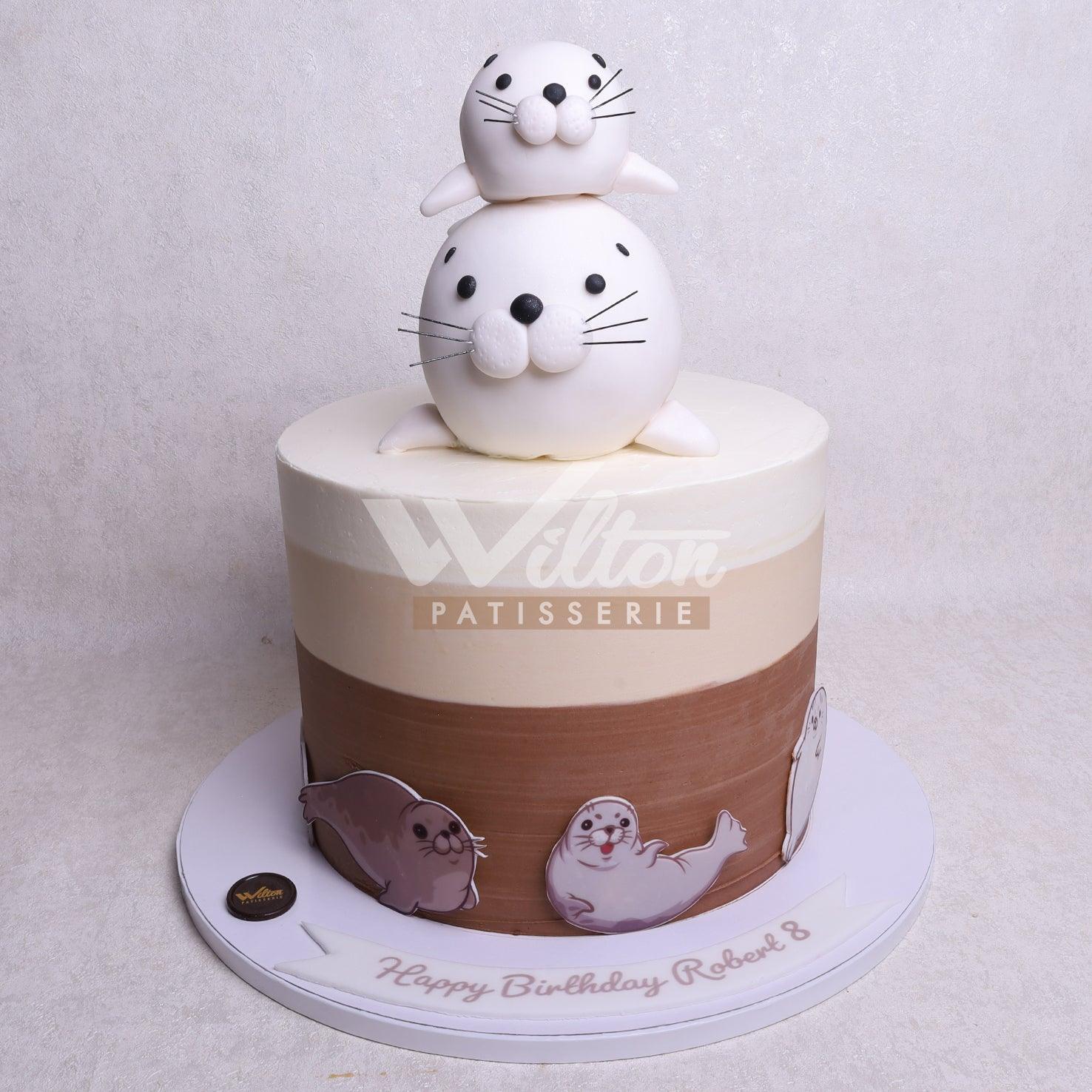 D.56.a SEAL - Children Birthday Cakes - WILTON PATISSERIE