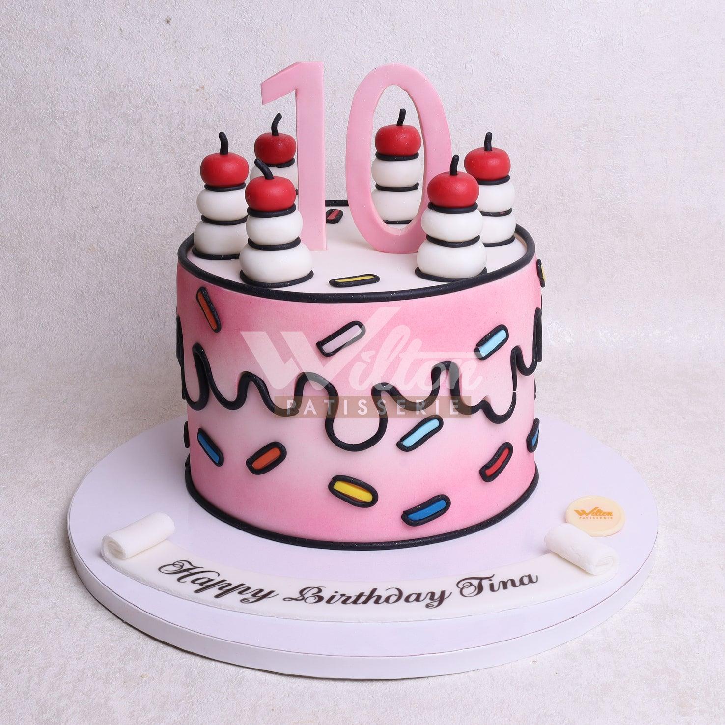 D.57.b CANDLE - Children Birthday Cakes - WILTON PATISSERIE