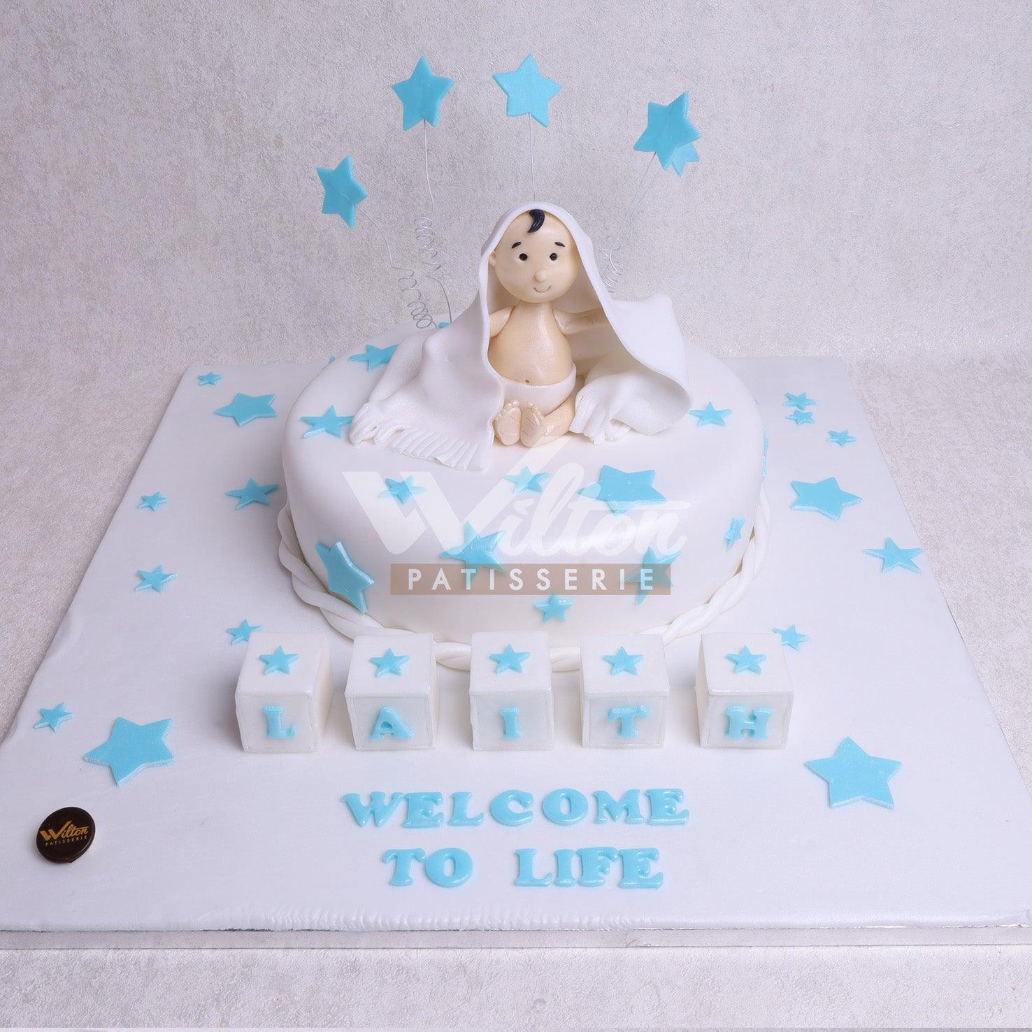 D.22.a WELCOME TO LIFE - Children Birthday Cakes - WILTON PATISSERIE